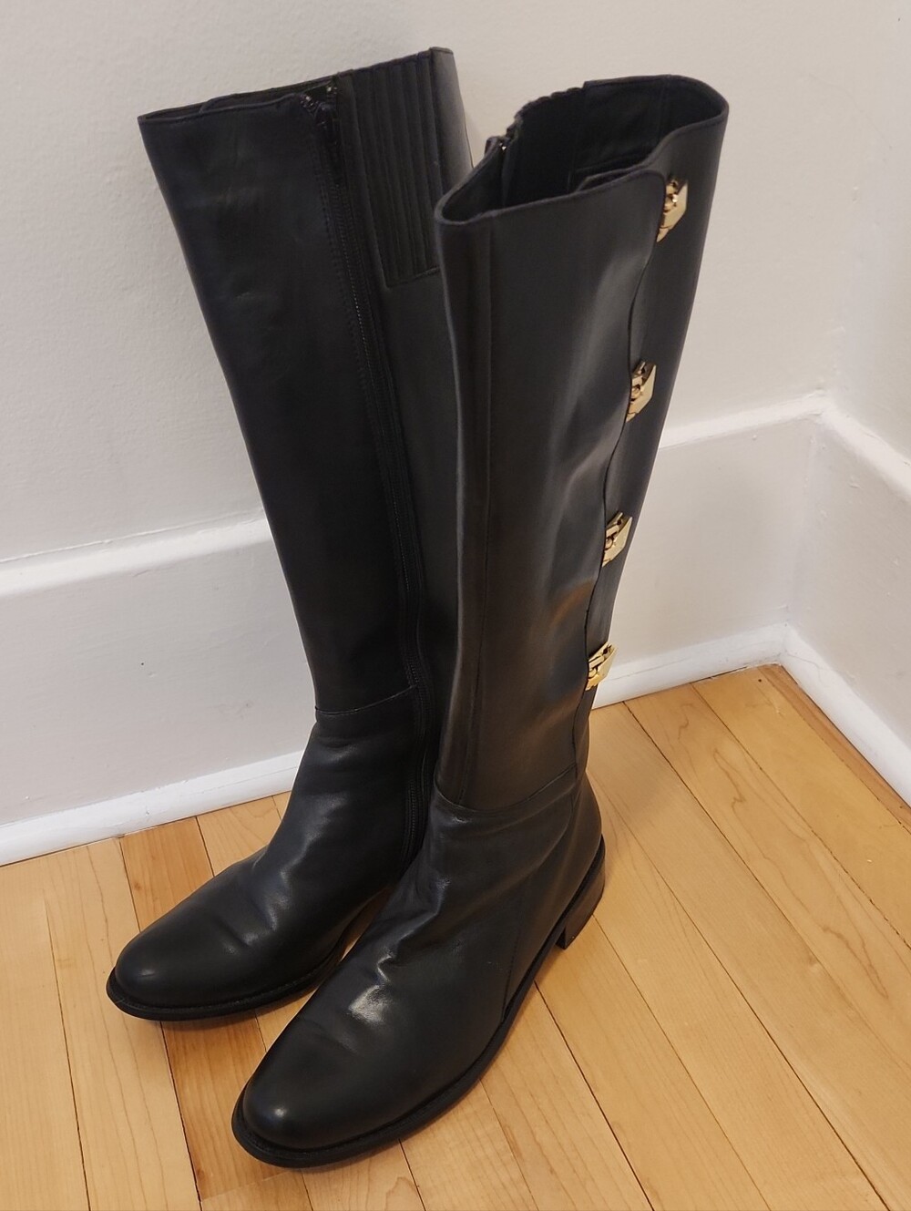 Vaneli Black Knee High Leather Boots with Gold Buckle Accents